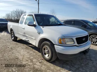 2000 Ford F-150 XL with VIN 1FTRX17L8YNB40935, listed as a Copart auction lot 86726884 with 260,636 mi miles and Salvage Title. Bid and sale history available at carsss.com. Image 4.