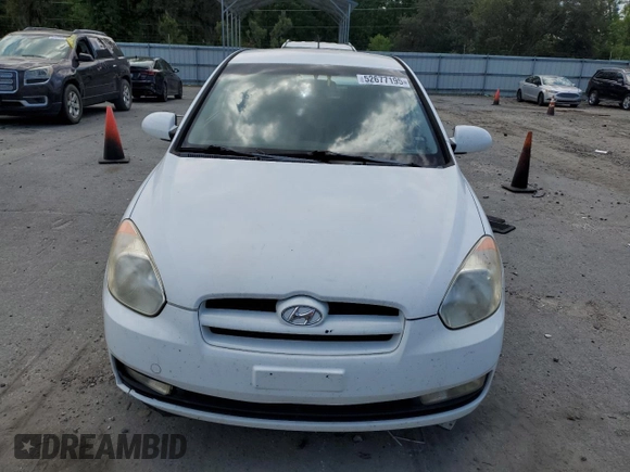 2007 Hyundai Accent SE with VIN KMHCN36C67U050000, listed as a Copart auction lot 52677195 with 120,282 mi miles and Clean Title. Bid and sale history available at carsss.com. Image 5.