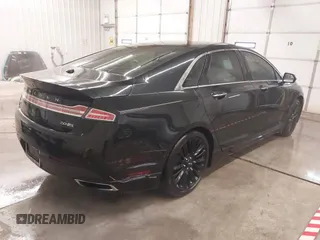 2015 Lincoln MKZ z VIN 3LN6L2J95FR620390, wystawiony jako IAAI lot #41586267 z przebiegiem 127 870 mil mil oraz . Historia ofert i sprzedaży dostępna na DreamBid. Obrazek 4.