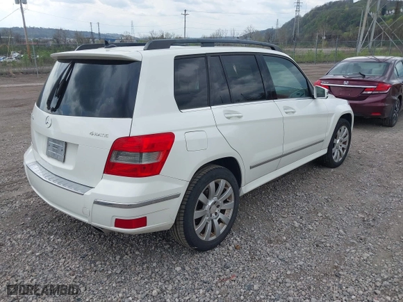 2012 Mercedes-Benz GLK-Class GLK 350 with VIN WDCGG8HB4CF863801, listed as a IAAI auction lot 42000502 with 268,732 mi miles. Bid and sale history available at carsss.com. Image 4.