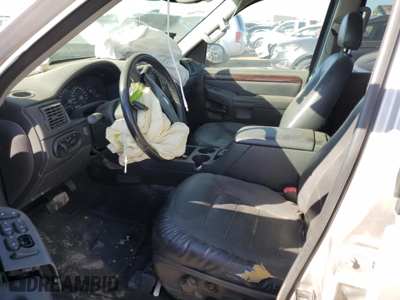 2004 Ford Explorer with VIN 1FMDU75K54UA36401, listed as a Copart auction lot 71855834 with 236,547 mi miles and Salvage title. Bid and sale history available at DreamBid. Image 7.
