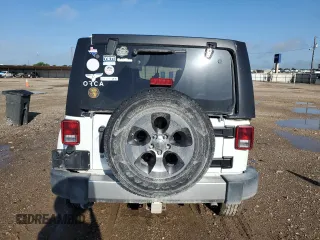2016 Jeep Wrangler Unlimited Sahara with VIN 1C4BJWEG6GL301301, listed as a Copart auction lot 54362595 with 110,295 mi miles and Salvage title. Bid and sale history available at DreamBid. Image 6.