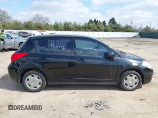 2012 Nissan Versa S with VIN 3N1BC1CP9CK290446, listed as a IAAI auction lot 41861756 with 124,883 mi miles. Bid and sale history available at carsss.com. Image 13.