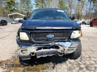 2003 Ford F-150 XLT with VIN 1FTRW08L63KB47470, listed as a Copart auction lot 50400055 with 223,859 mi miles and Salvage Title. Bid and sale history available at carsss.com. Image 5.