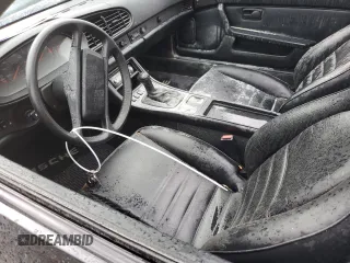 1987 Porsche 944 z VIN WP0AB0946HN474232, wystawiony jako Copart lot #64654684 z przebiegiem 87 126 mil mil oraz Szkoda całkowita • Salvage title. Historia ofert i sprzedaży dostępna na DreamBid. Obrazek 7.