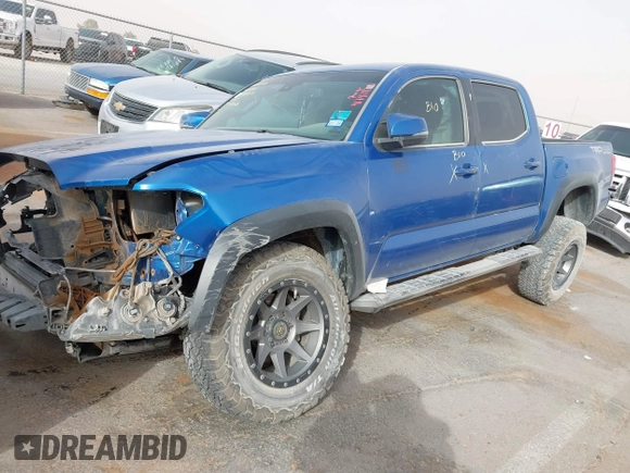 2018 Toyota Tacoma SR with VIN 3TMCZ5AN1JM124111, listed as a IAAI auction lot 41741973 with 90,175 mi miles. Bid and sale history available at carsss.com. Image 2.
