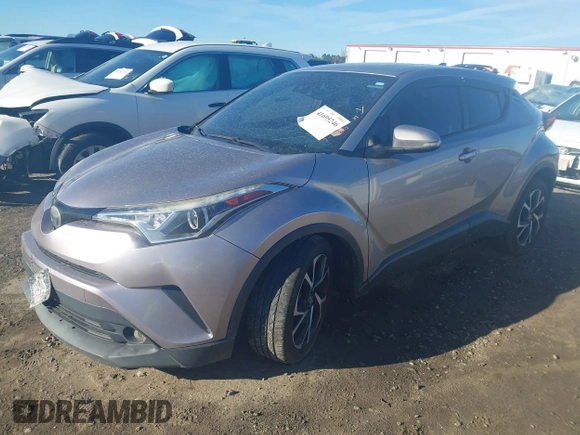 2018 Toyota C-HR XLE with VIN NMTKHMBX3JR048303, listed as a IAAI auction lot 41695246 with 125,081 mi miles. Bid and sale history available at carsss.com. Image 17.