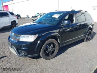 2019 Dodge Journey SE with VIN 3C4PDCBB1KT859686, listed as a IAAI auction lot 41548860 with 68,955 mi miles. Bid and sale history available at carsss.com. Image 2.