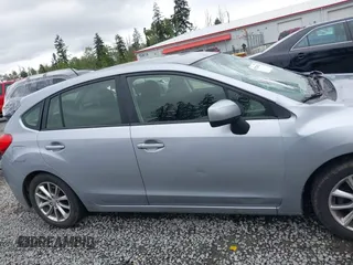 2014 Subaru Impreza Premium z VIN JF1GPAC63E8313171, wystawiony jako IAAI lot #42270472 z przebiegiem 176 818 mil mil oraz . Historia ofert i sprzedaży dostępna na DreamBid. Obrazek 13.