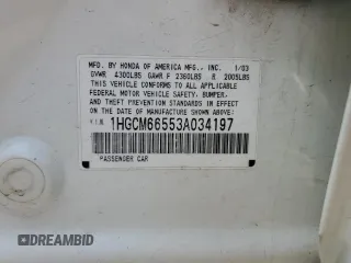 2003 Honda Accord EX z VIN 1HGCM66553A034197, wystawiony jako Copart lot #59805425 z przebiegiem 238 447 mil mil oraz Nie do naprawy • Non repairable. Historia ofert i sprzedaży dostępna na DreamBid. Obrazek 13.