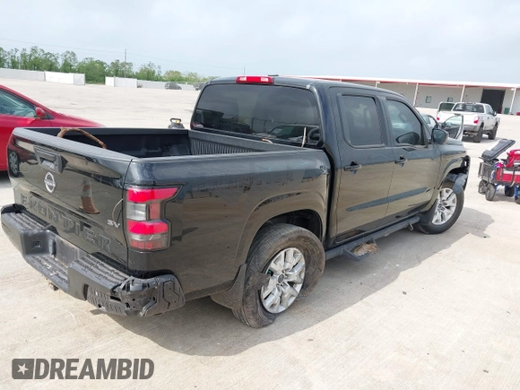 2022 Nissan Frontier SV with VIN 1N6ED1EJ2NN677012, listed as a IAAI auction lot 41967201 with 76,835 mi miles and . Bid and sale history available at DreamBid. Image 4.