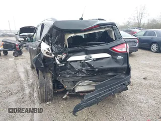 2014 Ford Escape SE z VIN 1FMCU9G94EUD64427, wystawiony jako IAAI lot #41965103 z przebiegiem 66 429 mil mil oraz . Historia ofert i sprzedaży dostępna na DreamBid. Obrazek 6.
