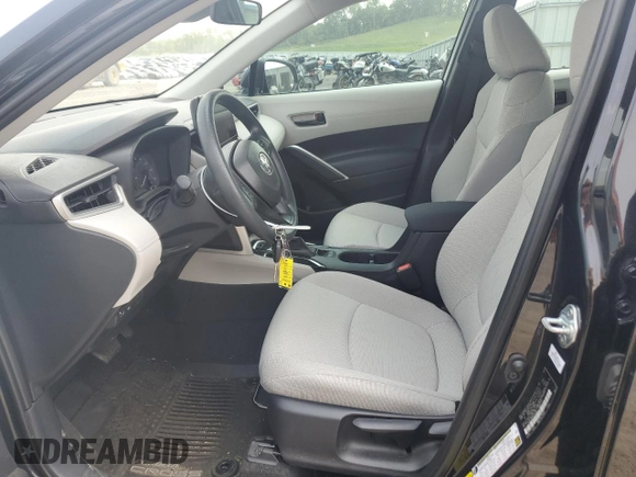 2024 Toyota Corolla Cross L with VIN 7MUAAAAG4RV097805, listed as a Copart auction lot 59846765 with 11,427 mi miles and Salvage title. Bid and sale history available at DreamBid. Image 7.