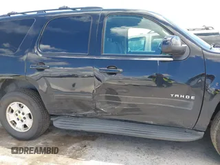2013 Chevrolet Tahoe LS with VIN 1GNSCAE04DR104790, listed as a IAAI auction lot 42225652 with 119,948 mi miles and . Bid and sale history available at DreamBid. Image 6.