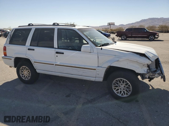 1995 Jeep Grand Cherokee Limited with VIN 1J4GZ78Y3SC701103, listed as a Copart auction lot 72038184 with 143,829 mi miles and Salvage Title. Bid and sale history available at carsss.com. Image 4.