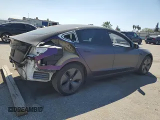 2019 Tesla Model 3 Long Range with VIN 5YJ3E1EB0KF437418, listed as a Copart auction lot 50729915 with 105,148 mi miles and Salvage Title. Bid and sale history available at DreamBid. Image 3.