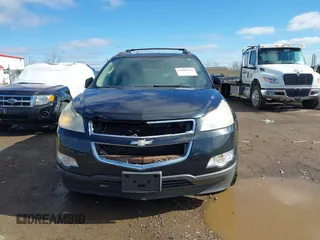 2011 Chevrolet Traverse LTZ with VIN 1GNKVLED5BJ197551, listed as a IAAI auction lot 41800519 with 205,771 mi miles and . Bid and sale history available at DreamBid. Image 6.