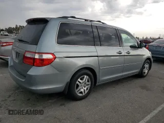 2007 Honda Odyssey EX-L z VIN 5FNRL38637B004323, wystawiony jako Copart lot #59626045 z przebiegiem 178 069 mil mil oraz Szkoda całkowita • Salvage title. Historia ofert i sprzedaży dostępna na DreamBid. Obrazek 3.