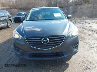 2016 Mazda CX-5 Sport with VIN JM3KE4BY5G0829927, listed as a IAAI auction lot 41678552 with 121,476 mi miles. Bid and sale history available at carsss.com. Image 12.