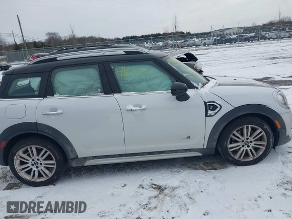 2019 MINI Countryman Cooper S z VIN WMZYT5C57K3G93801, wystawiony jako IAAI lot #41622941 z przebiegiem 66 093 mil mil oraz . Historia ofert i sprzedaży dostępna na DreamBid. Obrazek 13.