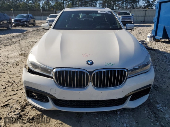 2016 BMW 7 Series 750i with VIN WBA7F0C56GGL99161, listed as a Copart auction lot 87652655 with 97,805 mi miles and Salvage Title. Bid and sale history available at carsss.com. Image 5.