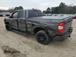 2021 Toyota Tundra SR with VIN 5TFUY5F18MX012725, listed as a Copart auction lot 52550205 with 54,727 mi miles and Salvage title. Bid and sale history available at DreamBid. Image 2.