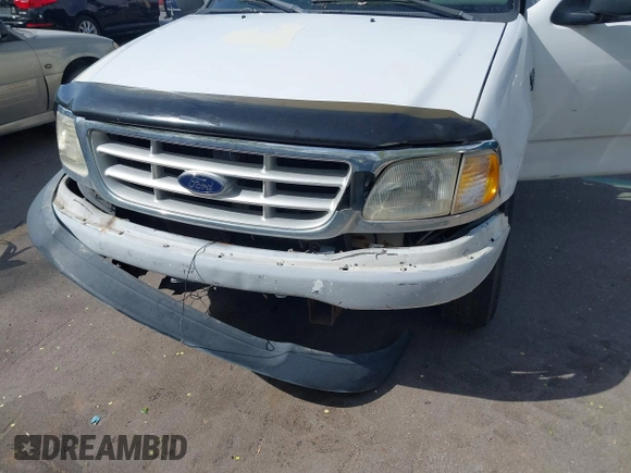 2003 Ford F-150 XL z VIN 2FTPF17Z73CA71197, wystawiony jako IAAI lot #42121486 z przebiegiem 236 800 mil mil oraz . Historia ofert i sprzedaży dostępna na DreamBid. Obrazek 6.