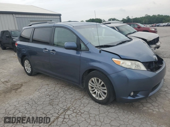 2014 Toyota Sienna XLE with VIN 5TDYK3DC2ES520840, listed as a Copart auction lot 59672295 with 194,143 mi miles and Salvage title. Bid and sale history available at DreamBid. Image 4.