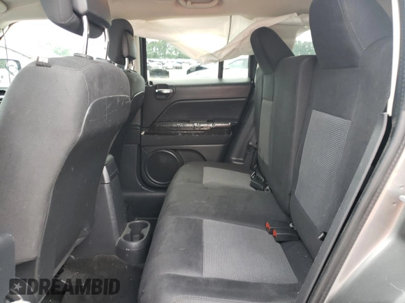 2014 Jeep Patriot Latitude z VIN 1C4NJRFB7ED501578, wystawiony jako Copart lot #63308005 z przebiegiem 76 100 mil mil oraz Szkoda całkowita • Salvage title. Historia ofert i sprzedaży dostępna na DreamBid. Obrazek 11.