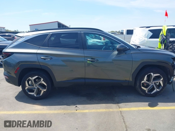 2022 Hyundai Tucson SEL z VIN 5NMJCCAE4NH096813, wystawiony jako IAAI lot #41899641 z przebiegiem 23 668 mil mil oraz . Historia ofert i sprzedaży dostępna na DreamBid. Obrazek 14.
