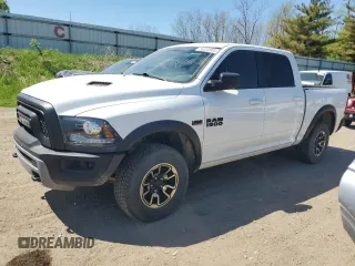 2017 Ram 1500 Rebel z VIN 1C6RR7YT7HS858318, wystawiony jako Copart lot #56338085 z przebiegiem 143 301 mil mil oraz Czysty tytuł • Clean title. Historia ofert i sprzedaży dostępna na DreamBid. Obrazek 1.