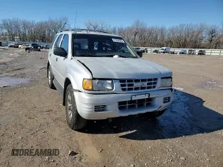 1999 Isuzu Rodeo S with VIN 4S2CK58WXX4373485, listed as a Copart auction lot 87804995 with 246,518 mi miles and Salvage title. Bid and sale history available at DreamBid. Image 12.