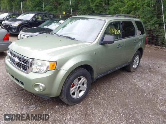 2008 Ford Escape Hybrid with VIN 1FMCU59H88KC30923, listed as a IAAI auction lot 42440706 with 98,635 mi miles and . Bid and sale history available at DreamBid. Image 2.