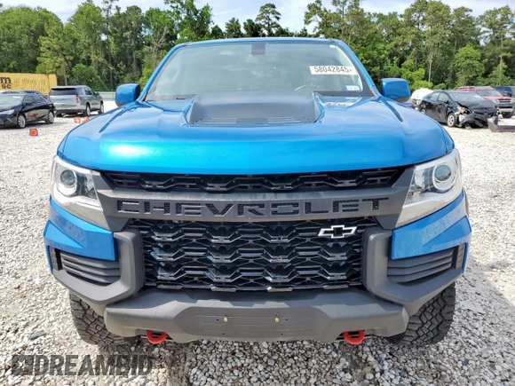 2021 Chevrolet Colorado 4WD ZR2 z VIN 1GCGTEEN7M1157788, wystawiony jako Copart lot #58042845 z przebiegiem 49 008 mil mil oraz Szkoda całkowita • Salvage title. Historia ofert i sprzedaży dostępna na DreamBid. Obrazek 5.