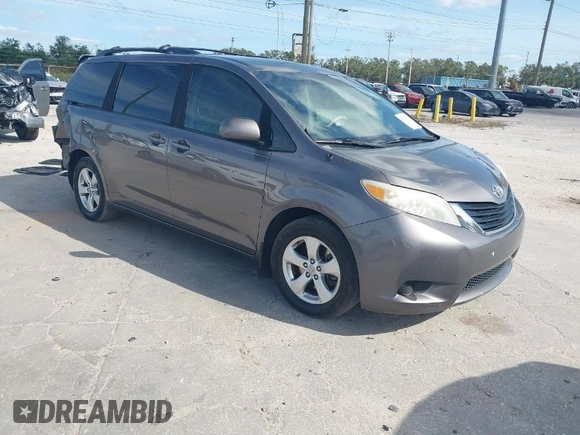 2014 Toyota Sienna LE AAS with VIN 5TDKK3DCXES432611, listed as a IAAI auction lot 40771635 with 214,145 mi miles and . Bid and sale history available at carsss.com. Image 1.