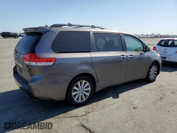 2014 Toyota Sienna Limited with VIN 5TDDK3DC0ES081720, listed as a Copart auction lot 63143875 with 213,928 mi miles and Clean title. Bid and sale history available at DreamBid. Image 3.