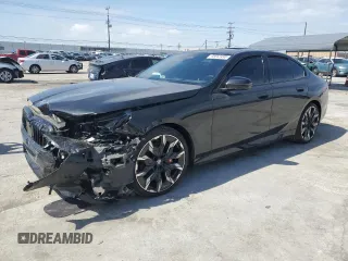 2024 BMW 5 Series 530i z VIN WBA43FJ08RCS17556, wystawiony jako Copart lot #48853495 z przebiegiem 4 151 mil mil oraz Szkoda całkowita • Salvage title. Historia ofert i sprzedaży dostępna na DreamBid. Obrazek 1.