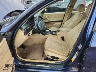 2011 BMW 3 Series 328i with VIN WBAPH5G54BNM74168, listed as a Copart auction lot 65030385 with 104,486 mi miles and Clean title. Bid and sale history available at DreamBid. Image 7.