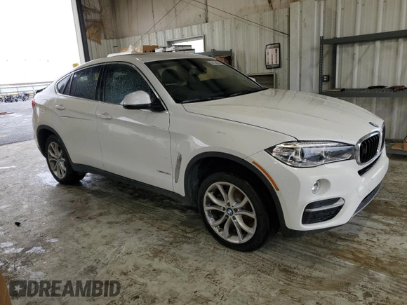 2015 BMW X6 sDrive35i with VIN 5UXKU0C50F0F91865, listed as a Copart auction lot 82128374 with 122,395 mi miles and Salvage Title. Bid and sale history available at carsss.com. Image 4.