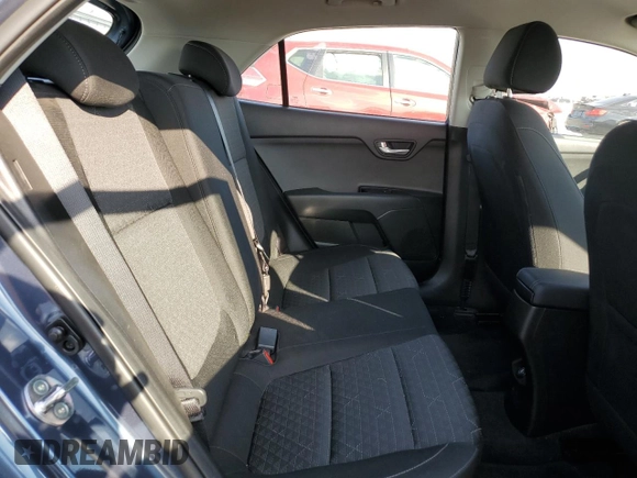 2023 Kia Rio S with VIN 3KPA25AD5PE548218, listed as a Copart auction lot 71808674 with 24,412 mi miles and Salvage Title. Bid and sale history available at DreamBid. Image 10.