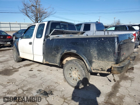 2001 Ford F-150 XL with VIN 1FTRX18L41NA31599, listed as a Copart auction lot 85222864 with 0 mi miles and Salvage Title. Bid and sale history available at carsss.com. Image 2.
