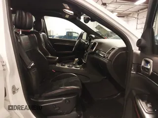 2017 Jeep Grand Cherokee Trailhawk with VIN 1C4RJFLG7HC712208, listed as a IAAI auction lot 42174543 with 158,518 mi miles and . Bid and sale history available at DreamBid. Image 5.