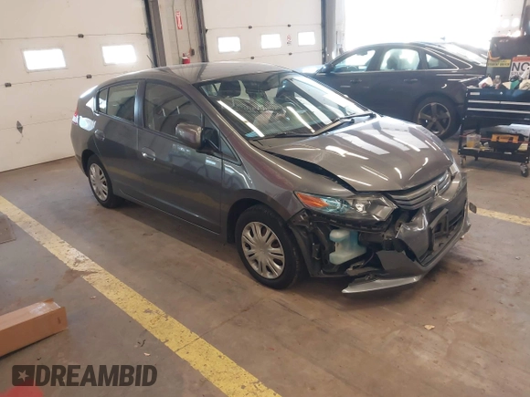 2010 Honda Insight LX with VIN JHMZE2H54AS040316, listed as a IAAI auction lot 41572246 with 142,850 mi miles and . Bid and sale history available at DreamBid. Image 1.
