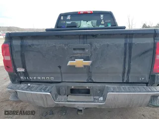 2014 Chevrolet Silverado 1500 LT with VIN 1GCRCREH1EZ399344, listed as a IAAI auction lot 41364007 with 217,707 mi miles. Bid and sale history available at carsss.com. Image 17.