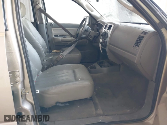 2005 Dodge Dakota Laramie with VIN 1D7HW58N15S159061, listed as a IAAI auction lot 41898306 with 114,288 mi miles and . Bid and sale history available at DreamBid. Image 5.