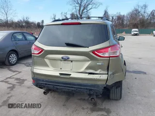 2013 Ford Escape SE with VIN 1FMCU9GX1DUB69236, listed as a IAAI auction lot 41575494 with 122,075 mi miles and . Bid and sale history available at DreamBid. Image 16.