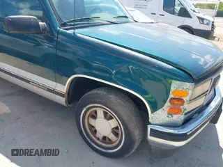 1995 GMC Suburban with VIN 1GKEC16KXSJ712111, listed as a IAAI auction lot 42185423 with 269,010 mi miles and . Bid and sale history available at DreamBid. Image 6.
