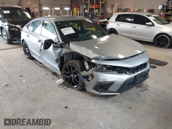 2023 Honda Civic Sport with VIN 19XFL2H80PE010679, listed as a IAAI auction lot 42026973 with 25,701 mi miles and . Bid and sale history available at DreamBid. Image 1.