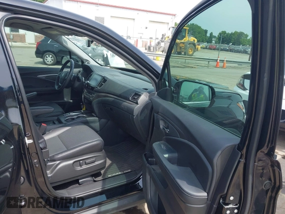 2023 Honda Ridgeline RTL-E with VIN 5FPYK3F76PB042100, listed as a IAAI auction lot 42274861 with 16,822 mi miles and . Bid and sale history available at DreamBid. Image 5.