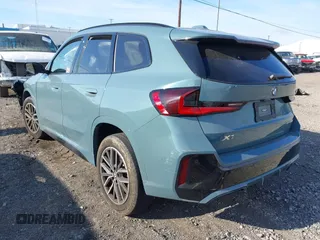 2023 BMW X1 xDrive28i with VIN WBX73EF08P5W08620, listed as a IAAI auction lot 40667319 with 1 mi miles. Bid and sale history available at carsss.com. Image 3.